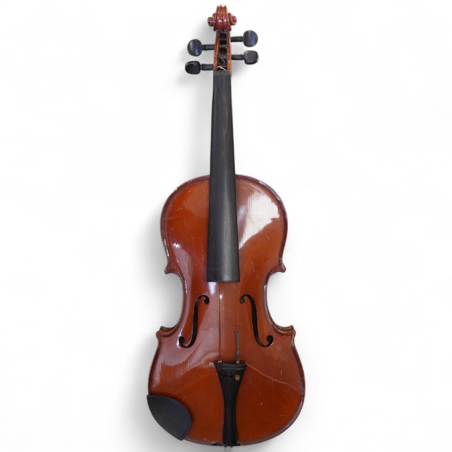 A cased students violin